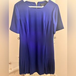 The dress is very classic and the color Navy blue